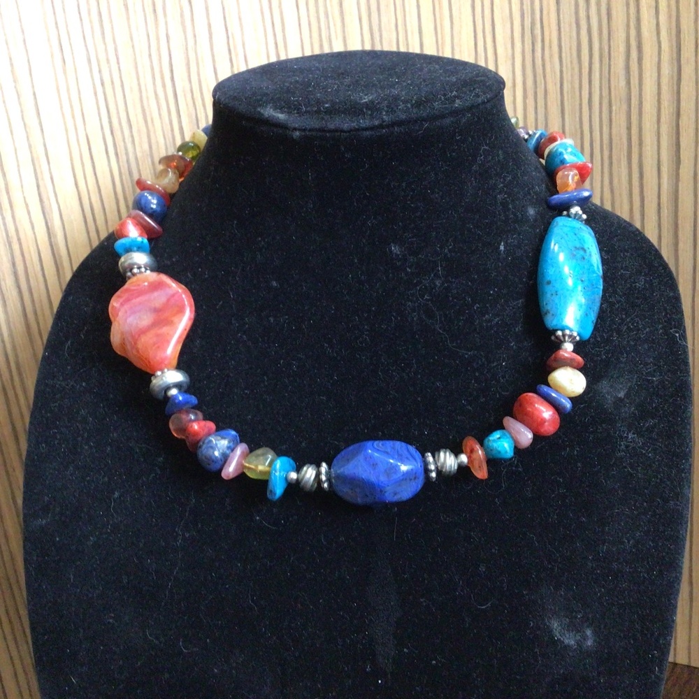 Beautiful beaded necklace with different size beads. Great shape.
